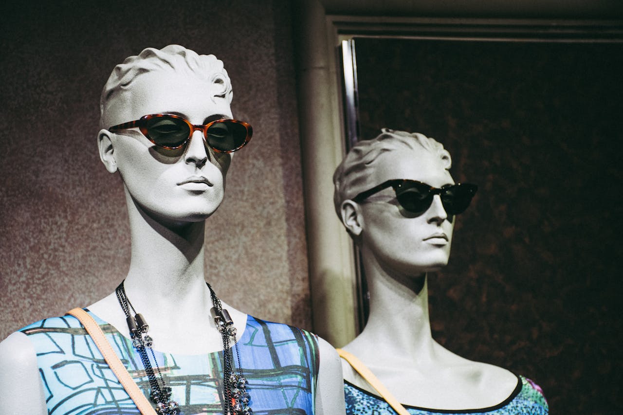 Two Female Mannequins Wearing Sunglasses